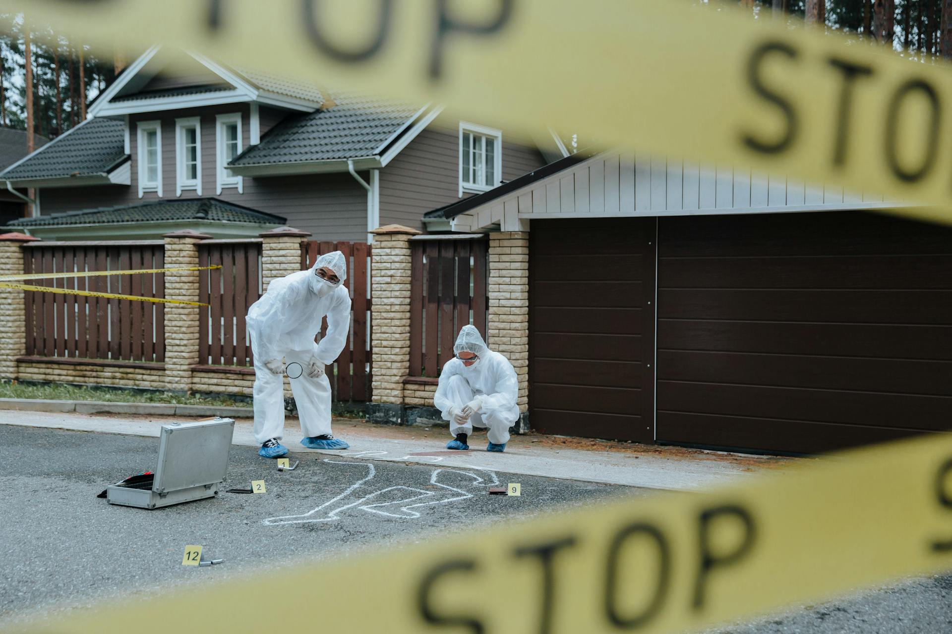 police officers collecting evidence from an accident scene